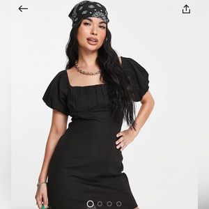 Black dress with square neck and puffy shoulders!